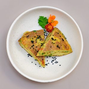 Balinese omelette served at THIS IS BALI restaurant in Ubud, made with fresh local herbs and spices from one of the best restaurants in Ubud