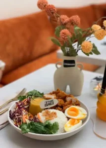 Authentic Indonesian dishes including rendang, sambal, and rice served at THIS IS BALI in Ubud