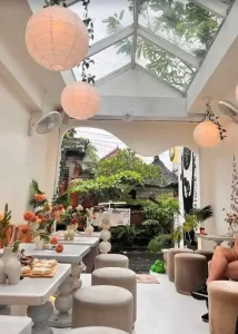 Crowded and vibrant dining scene at THIS IS BALI Restaurant in Ubud, popular among international tourists